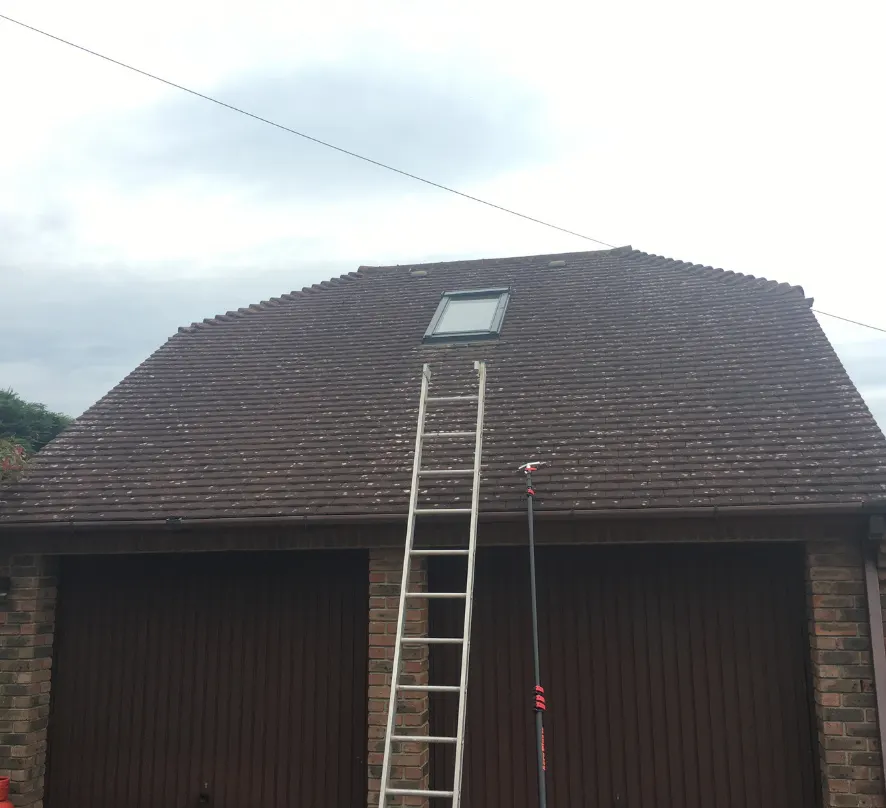 Dark, dirty garage roof before cleaning