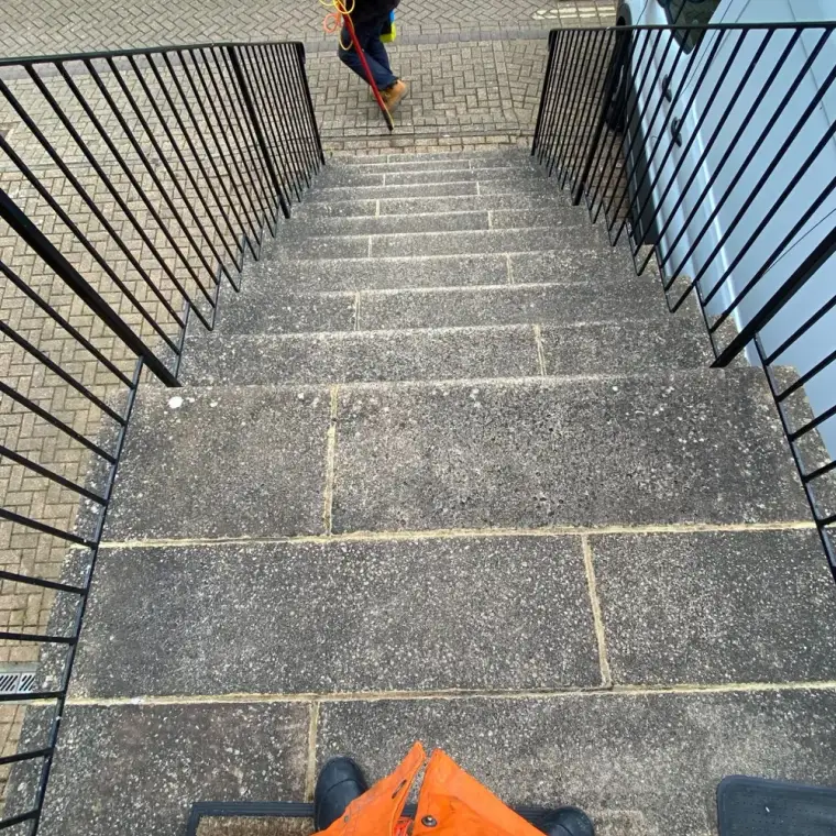 Grimy grey stone stairs before cleaning