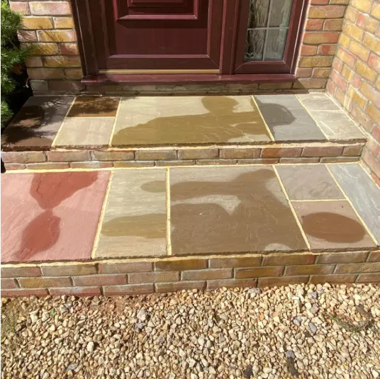 The same front steps after pressure washing